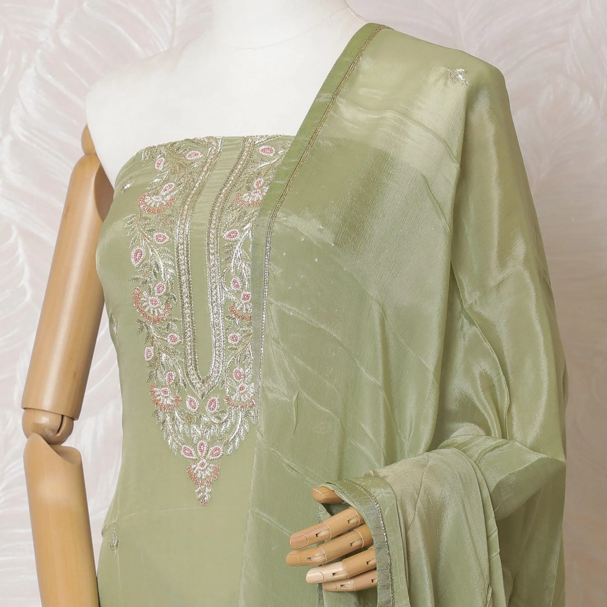 Sage green Premium pure silk crepe kameez with same tone embroidery and bead work in floral design. Sage green Plain salwar with same tone chiffon dupatta having same tone embroidery and stone work-D15571